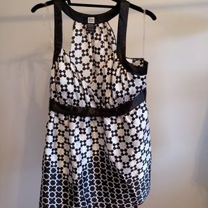 Black and white sleeveless blouse